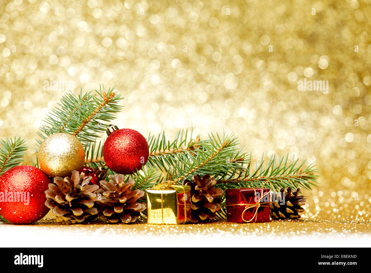 Christmas card with fir, balls and presents on glitter background Stock ...