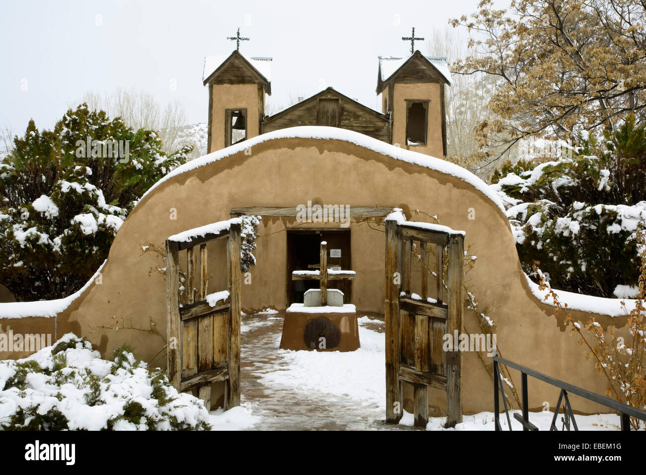 Santuario de Chimayo (1816) covered in snow, Chimayo, New Mexico USA