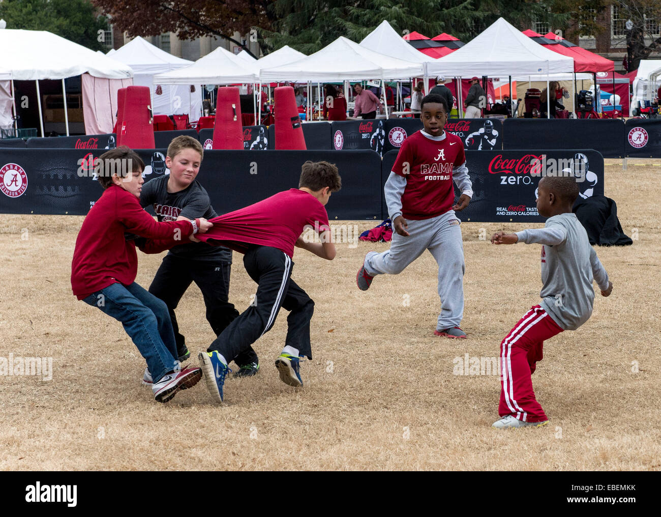 Tuscaloosa, Alabama, USA. 29th Nov, 2014. Boys play tackle football in