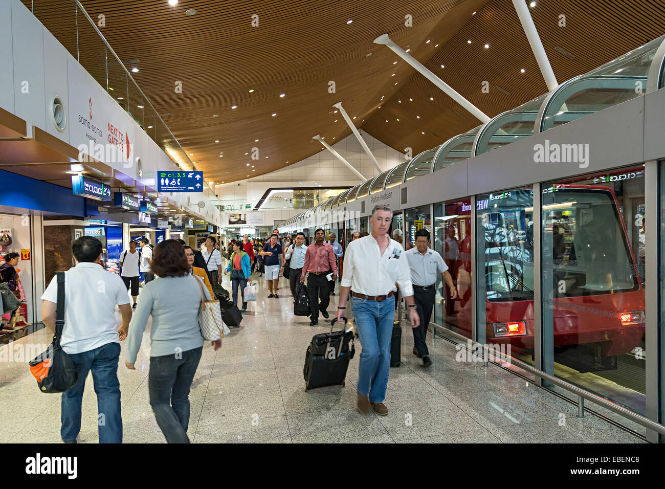Arriving by rail at international departure concourse, Kuala Lumpur airport, Malaysia Stock Photo