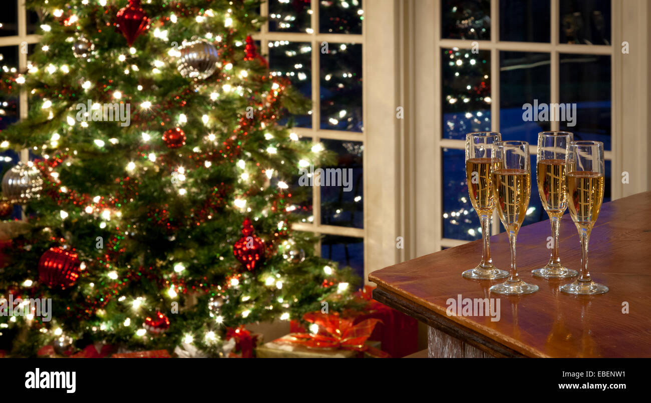 Christmas Tree with four glasses of champagne, USA Stock Photo