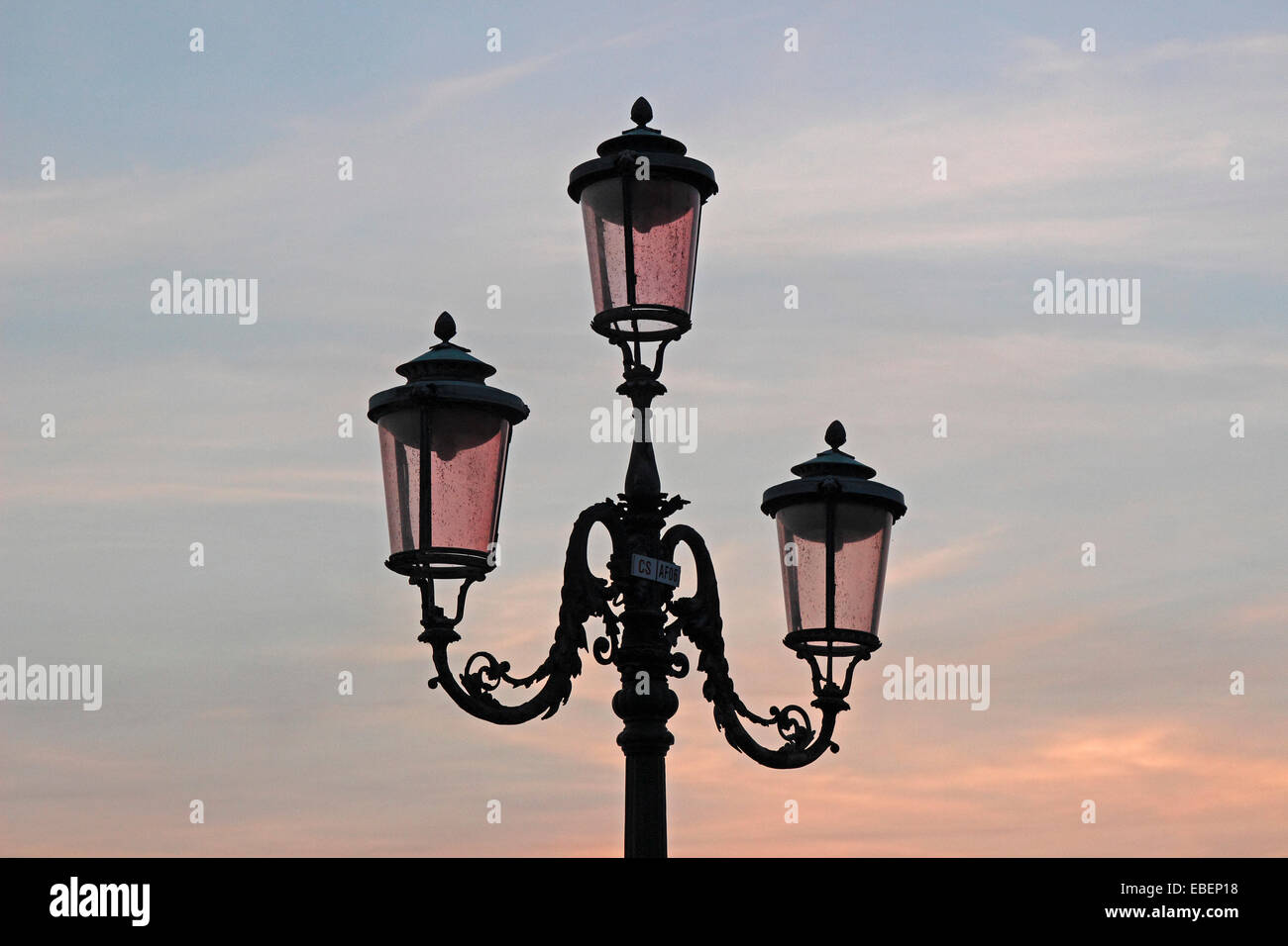 Venice Italy sunset over Venice Lagoon with street lamps Stock Photo ...