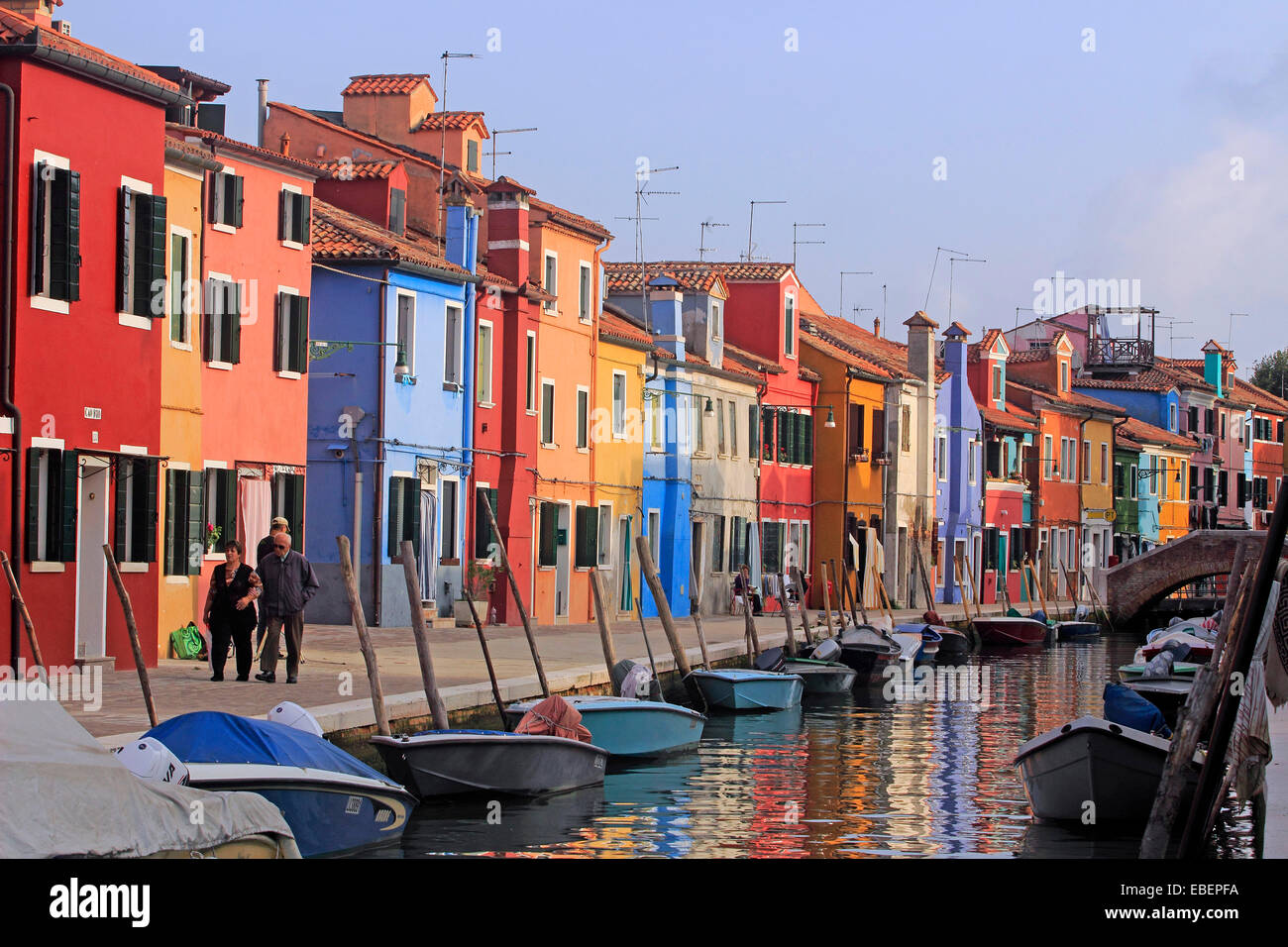 Venice Italy Burano reflections colorful houses along island canals Stock Photo