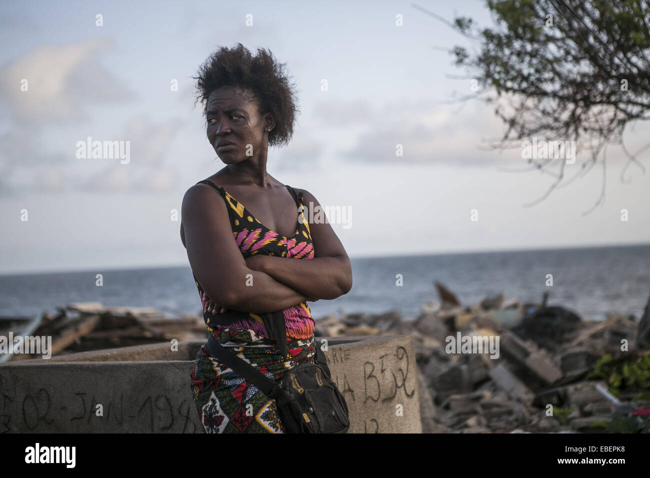 Oct. 21, 2014 - Abidjan, Ivory Coast - Viviane is moving back to her home country Ghana. She hasnÂ´t received any compensation and even if she did it would not be enough to buy a new place. (Credit Image: © Patrick Meinhardt/ZUMA Wire/ZUMAPRESS.com) Stock Photo