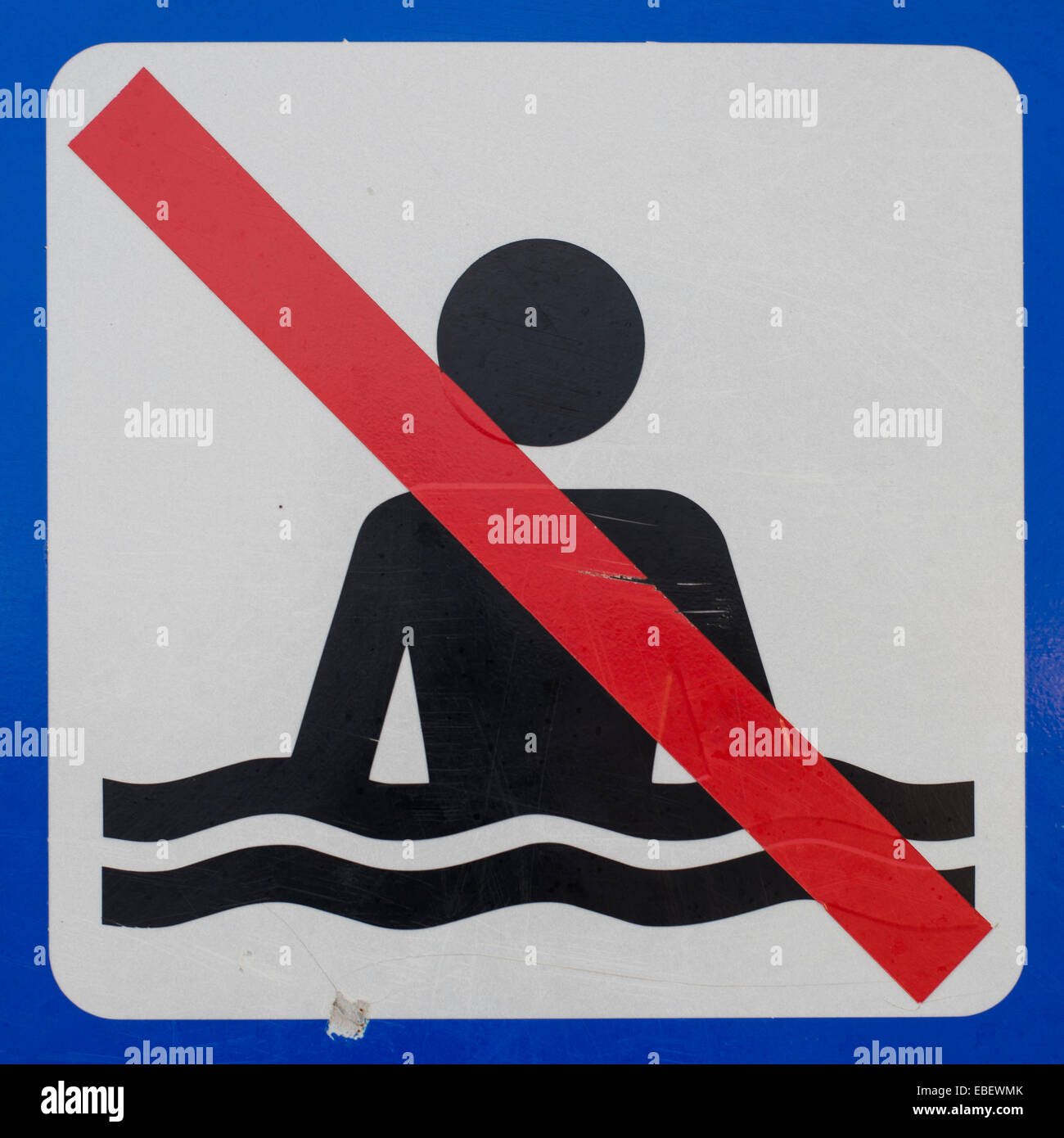 Closeup of a no bathing sign at the coast of Denmark Stock Photo