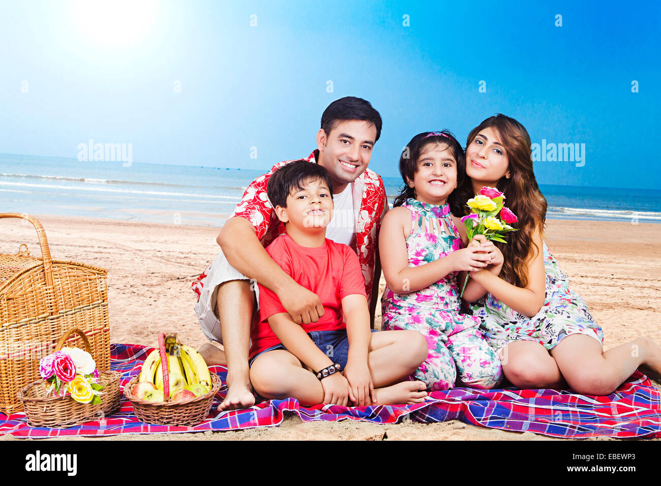 indian family beach Picnic Stock Photo