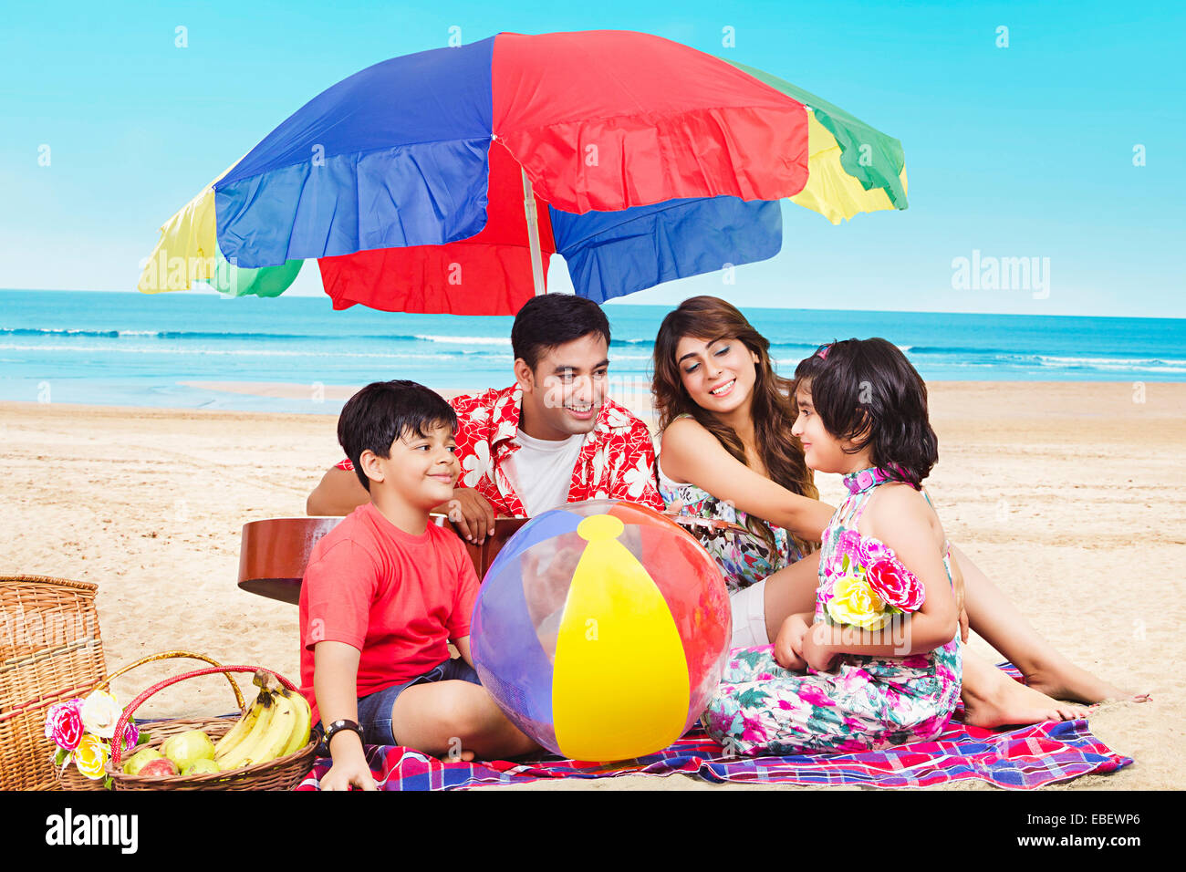 indian family beach enjoy Picnic Stock Photo