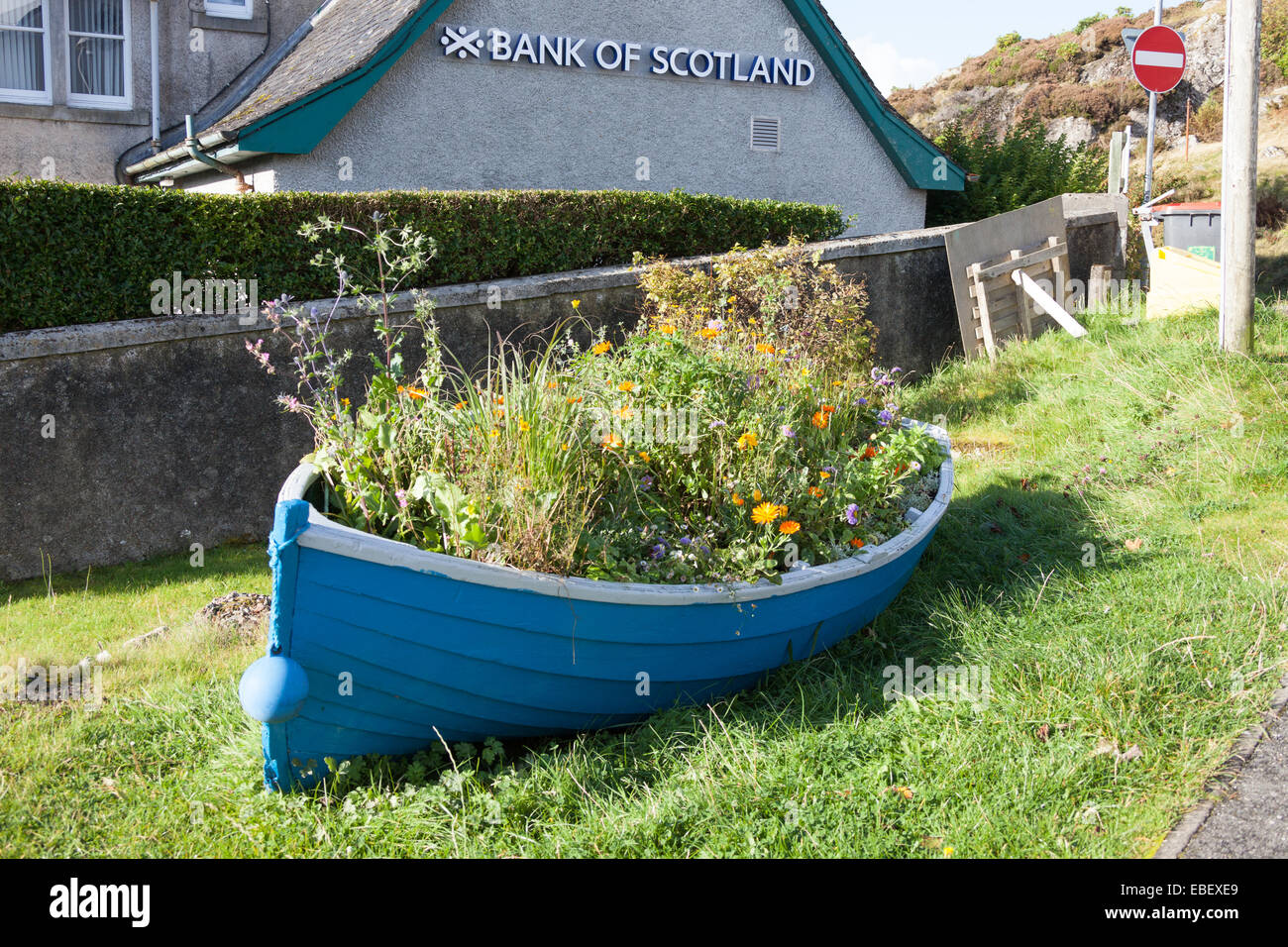 Old rowing boat used as a flower container in Tarbet, Isle of Harris ...