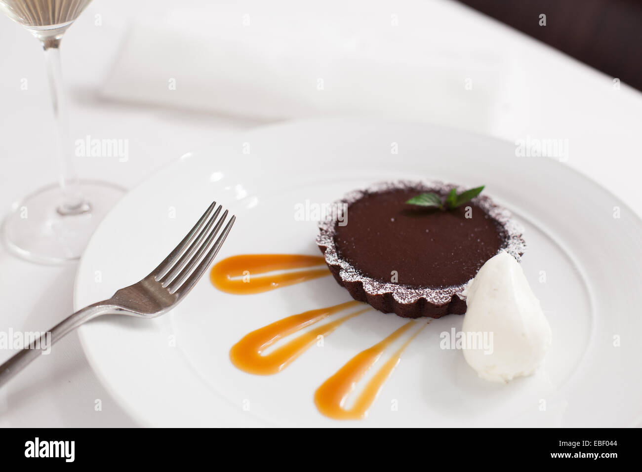 plated Chocolate torte with wine Stock Photo