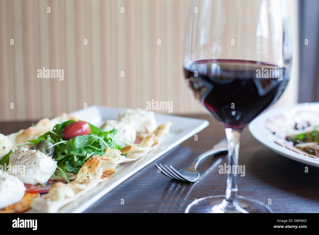 Caprese appetizer with red wine Stock Photo Alamy