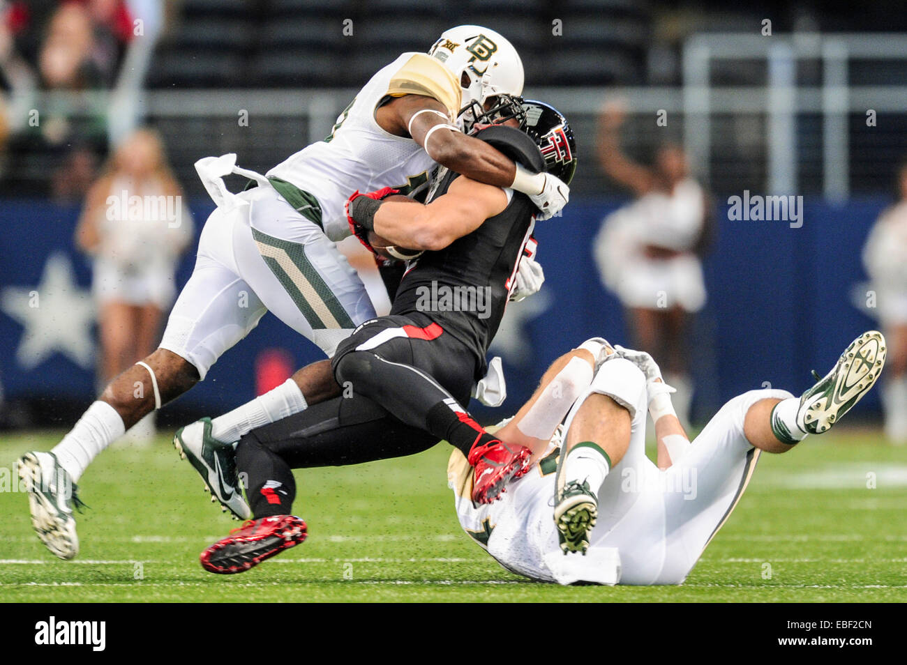 Texas Tech receiver Ian Sadler (12) is tackled by Baylor safety Terrell