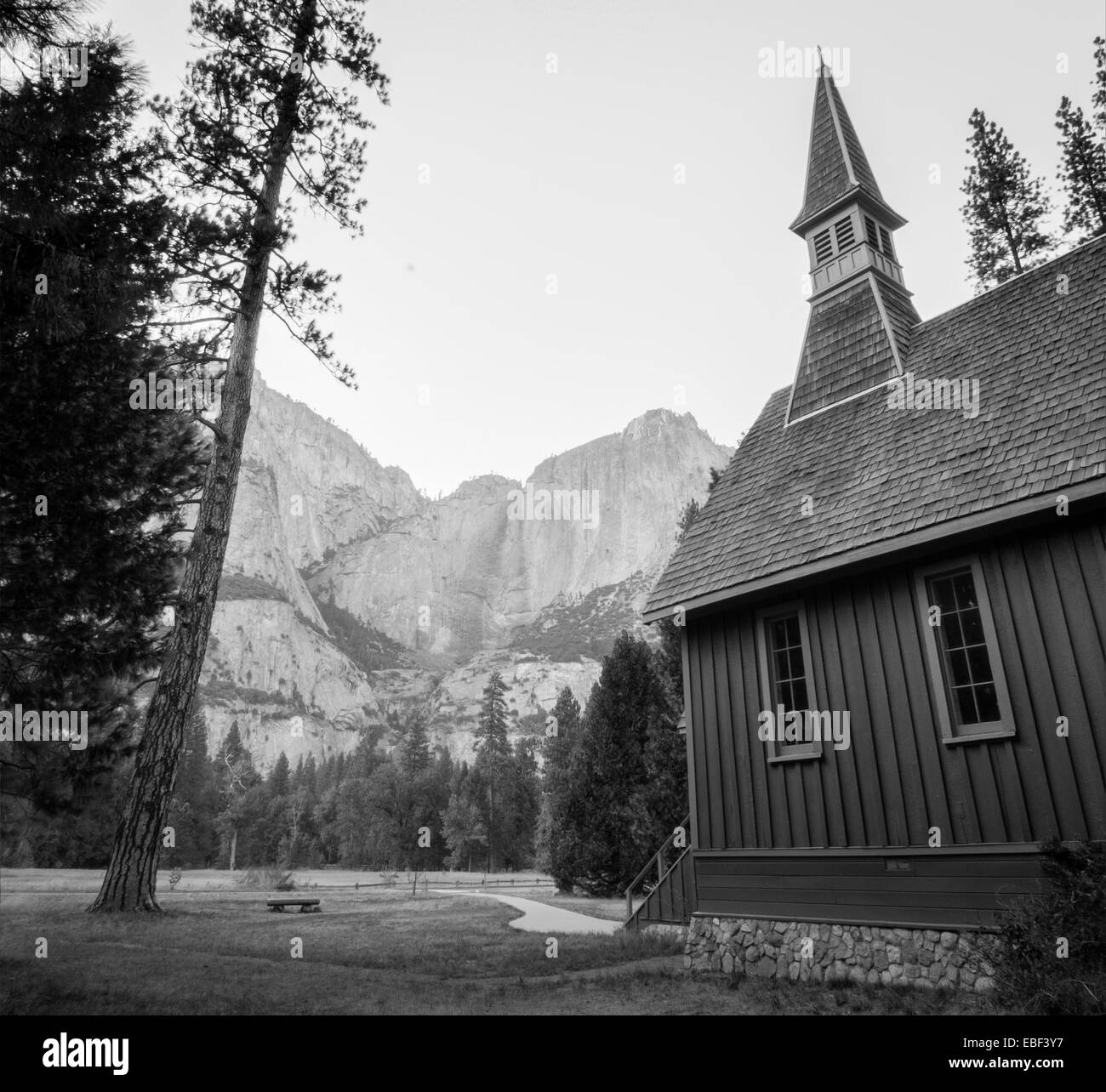 The Chapel in Yosemite Valley with Yosemite Falls in the background Stock Photo