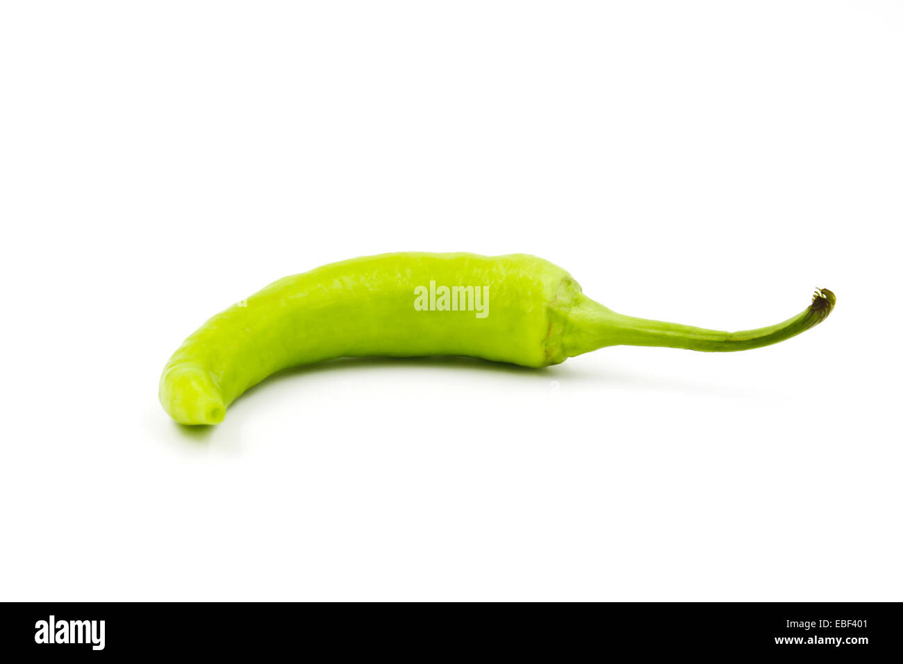Green chili pepper isolated on a white background Stock Photo - Alamy