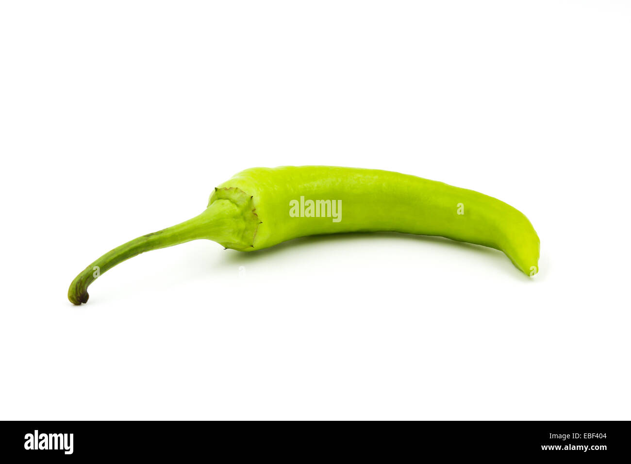 Green chili pepper isolated on a white background Stock Photo - Alamy