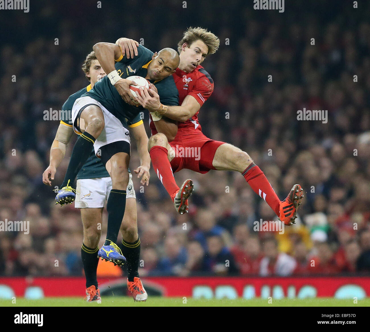 Cardiff, UK. 29th Nov, 2014. Cornal Hendricks of South Africa tackled by Liam Williams of Wales - Autumn Internationals - Wales vs South Africa - Millennium Stadium - Cardiff - Wales - 29th November 2014 - Picture Simon Bellis/Sportimage. Credit:  csm/Alamy Live News Stock Photo