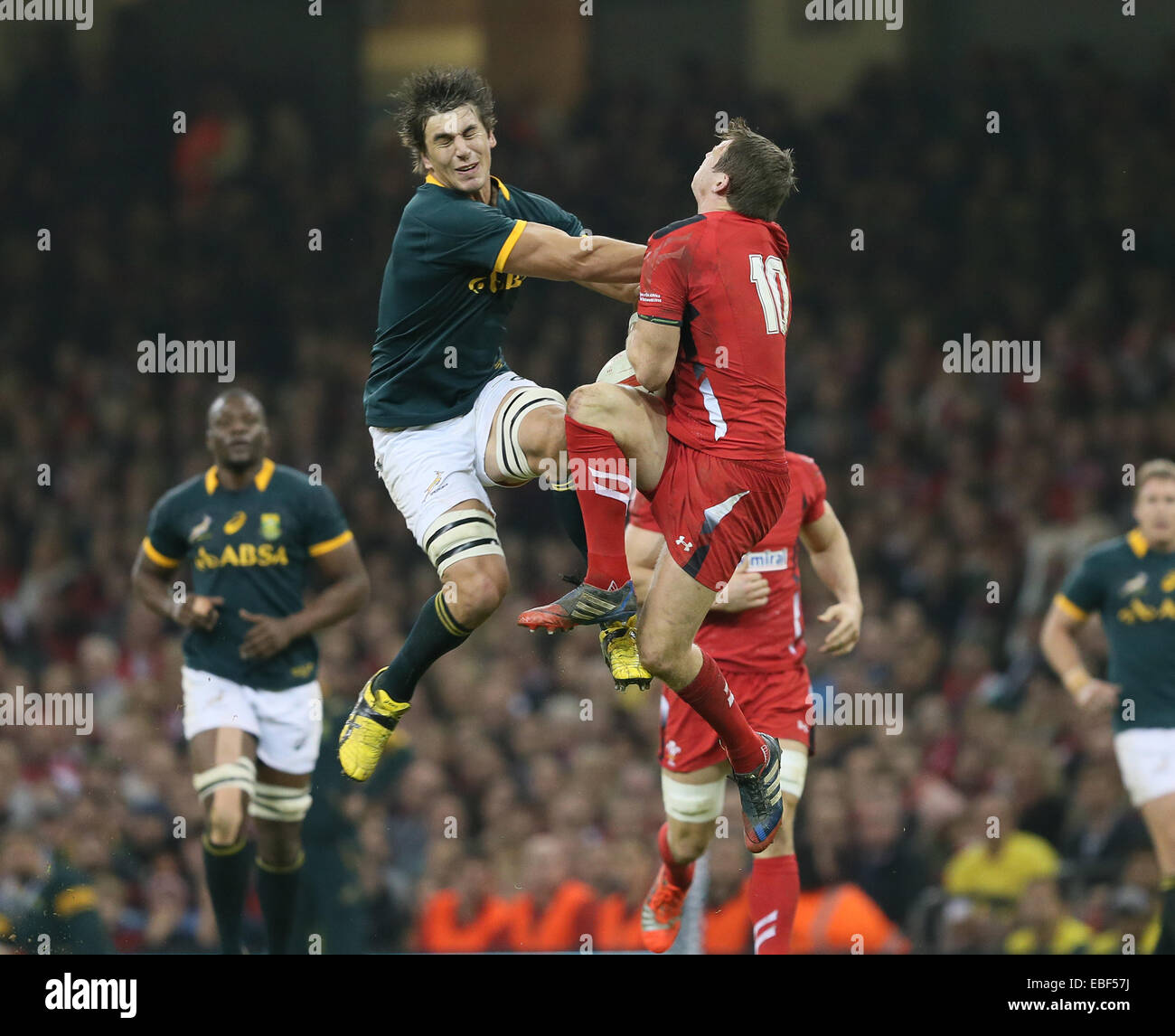 Cardiff, UK. 29th Nov, 2014. Dan Biggar of Wales is pushed by Eben Etzebeth of South Africa mid air - Autumn Internationals - Wales vs South Africa - Millennium Stadium - Cardiff - Wales - 29th November 2014 - Picture Simon Bellis/Sportimage. Credit:  csm/Alamy Live News Stock Photo