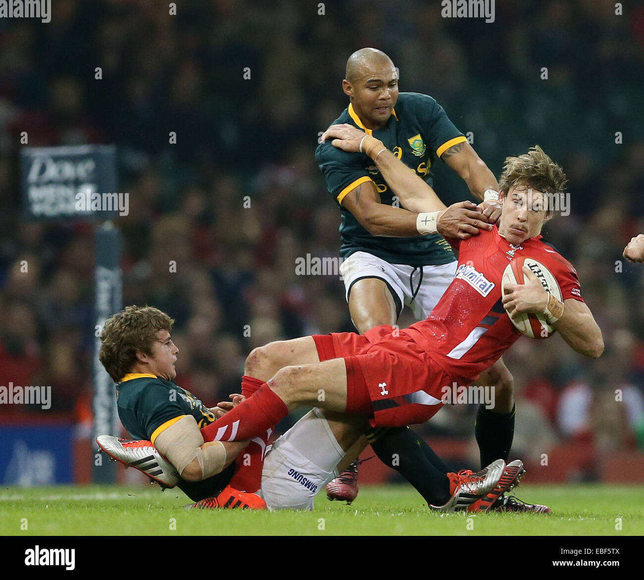 Cardiff, UK. 29th Nov, 2014. Liam Williams of Wales tackled by Pat Lambie of South Africa - Autumn Internationals - Wales vs South Africa - Millennium Stadium - Cardiff - Wales - 29th November 2014 - Picture Simon Bellis/Sportimage. Credit:  csm/Alamy Live News Stock Photo