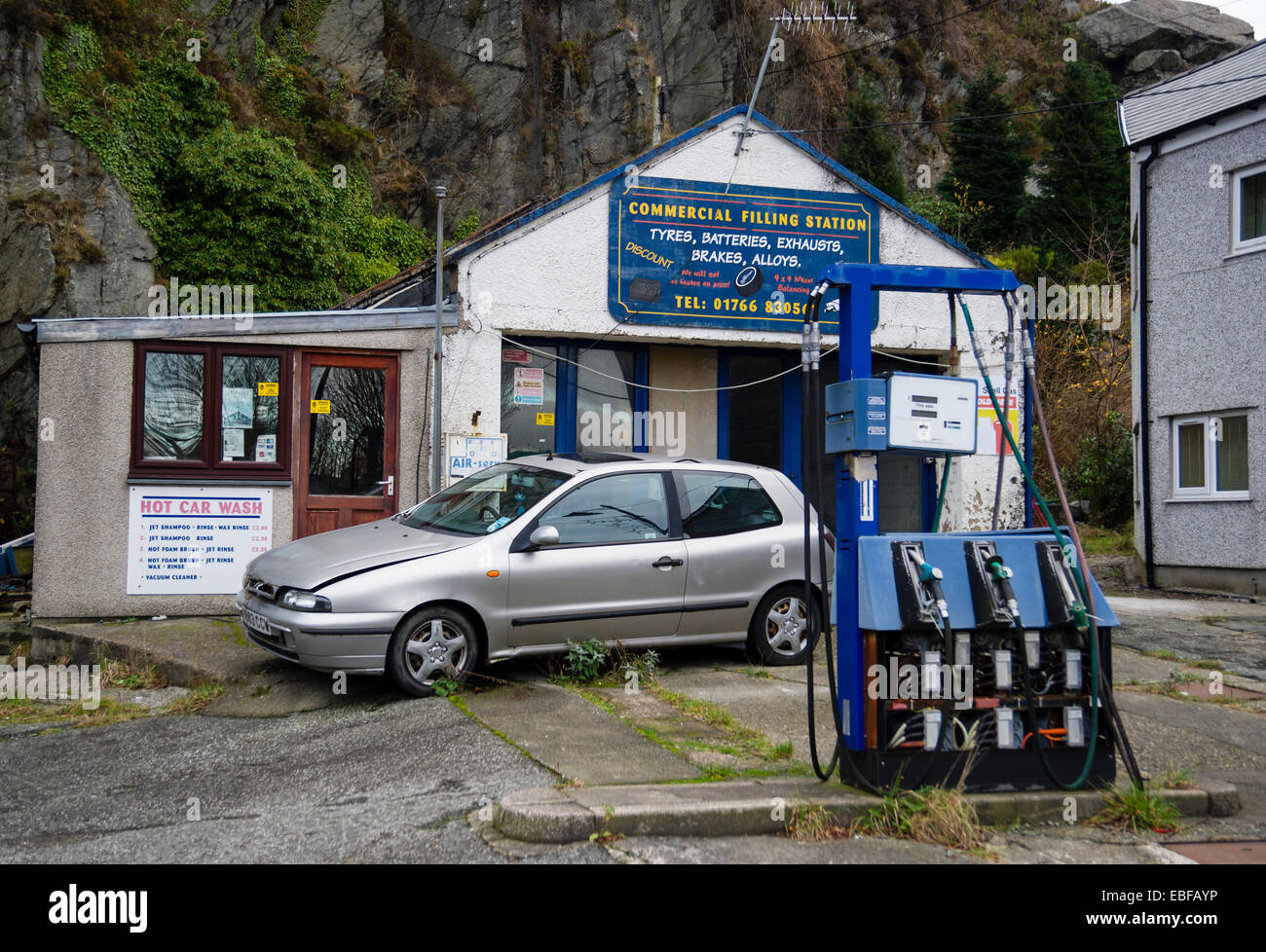 An empty fuel station and garage in Blaenau Ffestiniog Snowdonia Gwynedd North Wales. Stock Photo