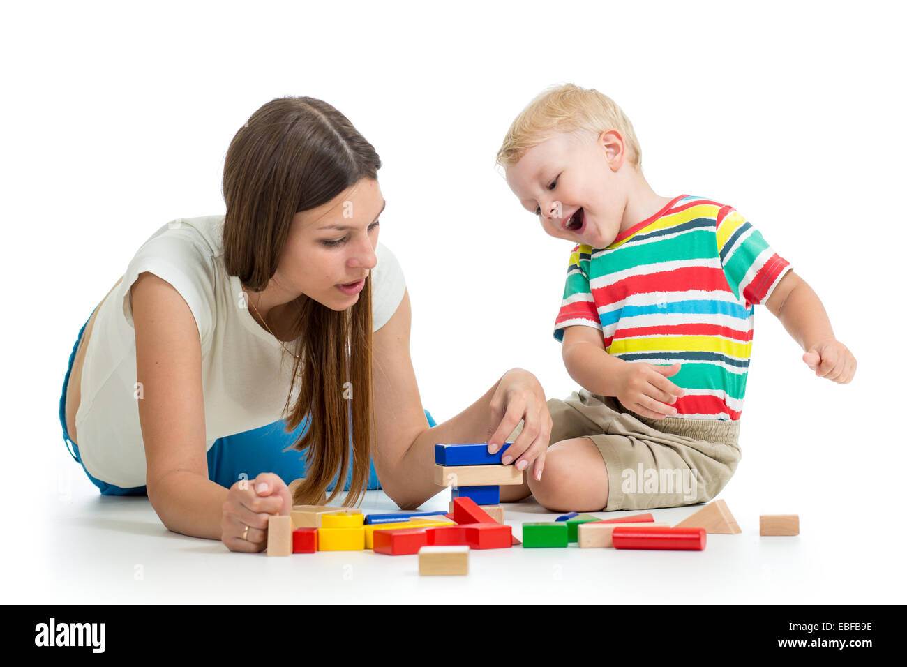 kid and his mom play toys together Stock Photo