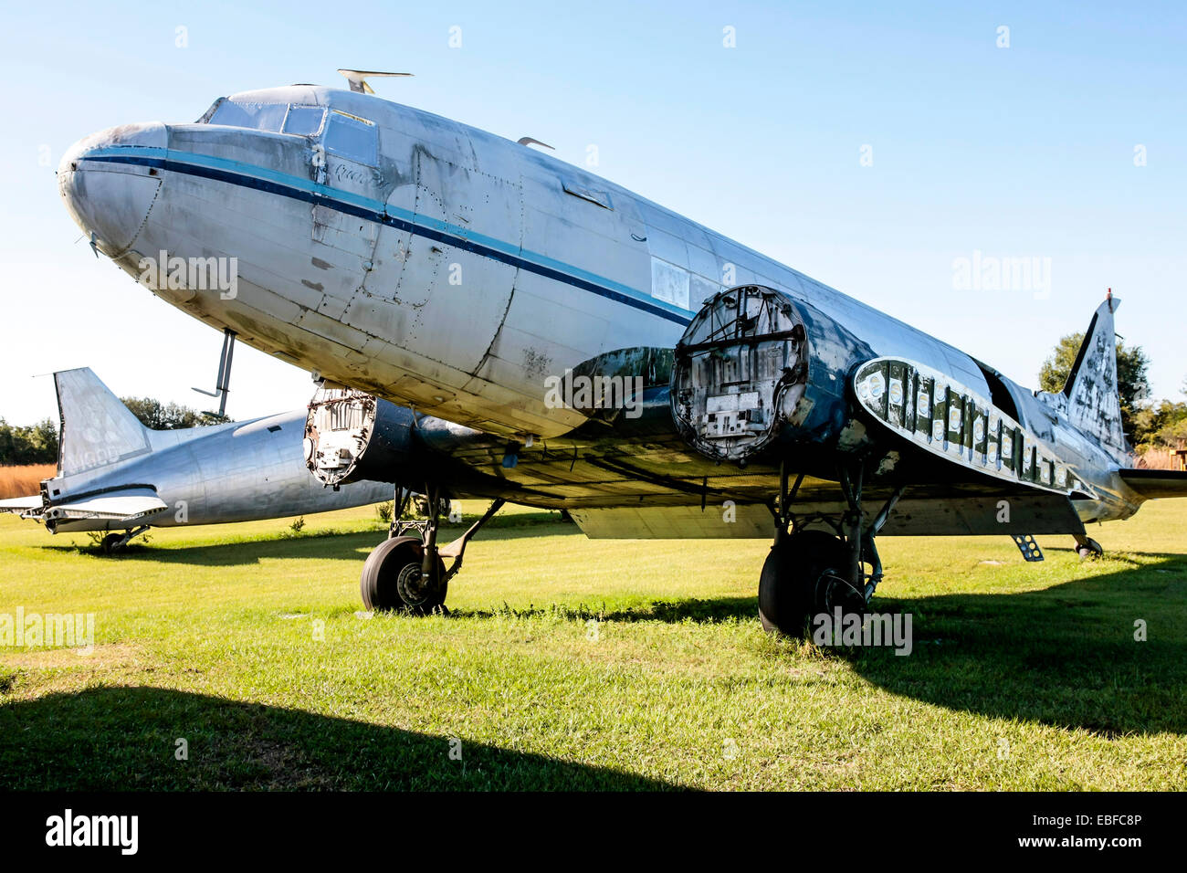 A group of Douglas DC-3 aircraft at an aviation junkyard in Florida Stock Photo