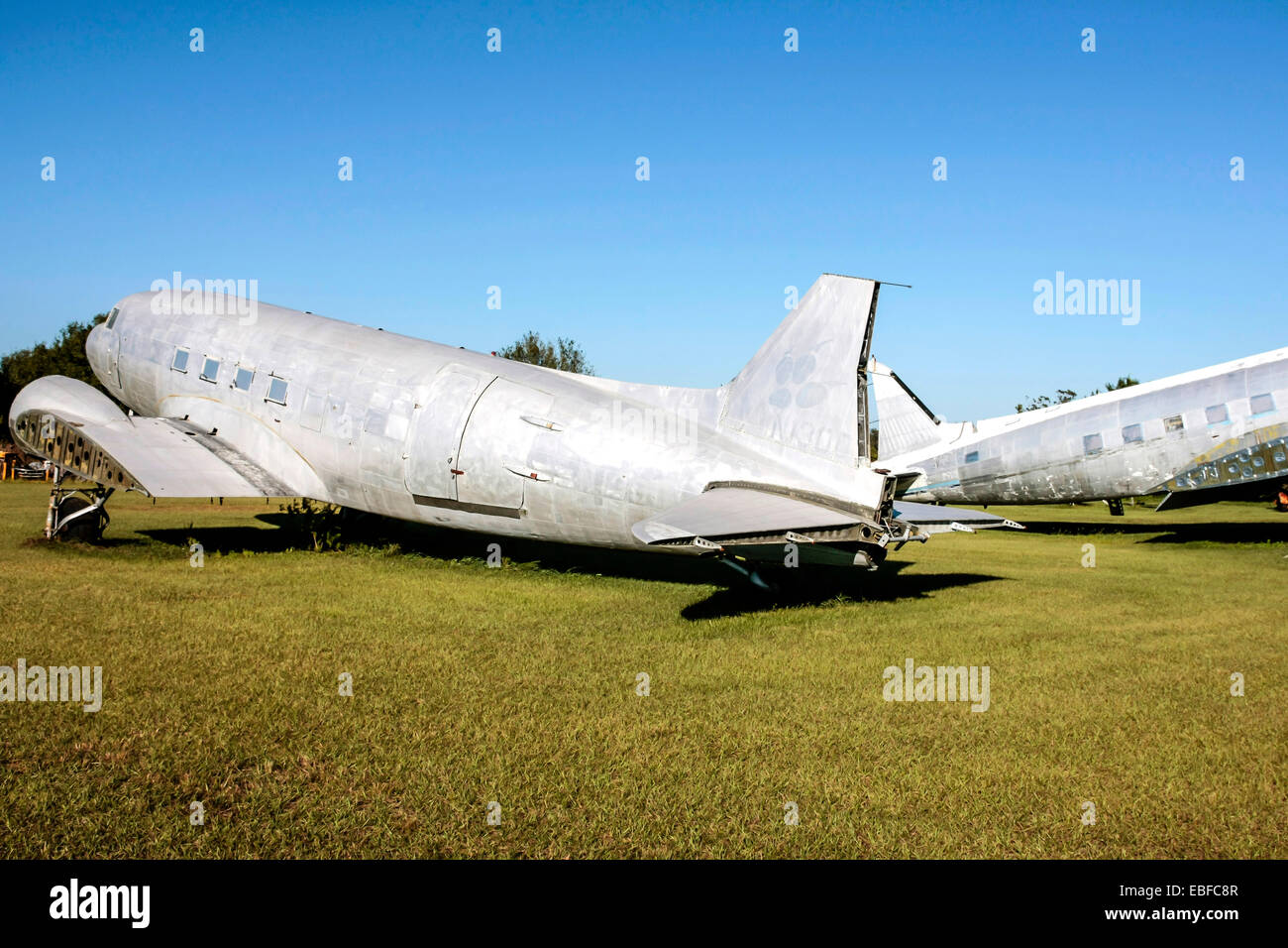 A group of Douglas DC-3 aircraft at an aviation junkyard in Florida Stock Photo
