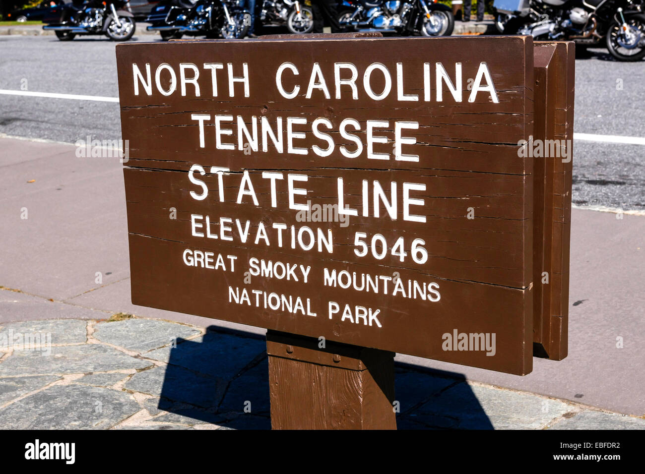 North Carolina and Tennessee State Line signpost at the top of the Great Smoky Mountains