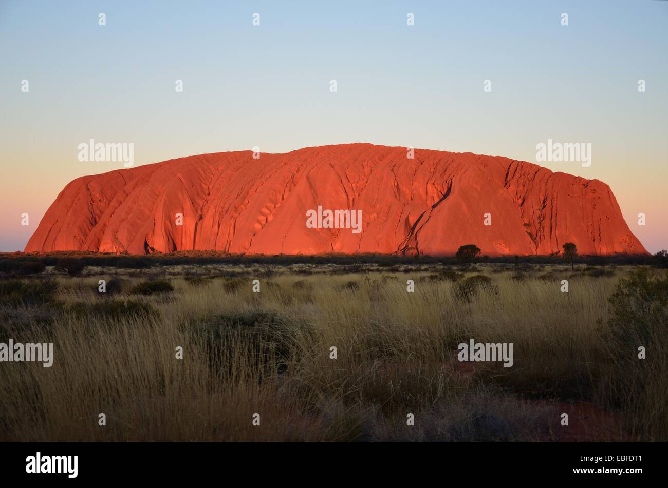 Sunset on Ayers Rock (Uluru) in Australian Nothern Territory Stock Photo