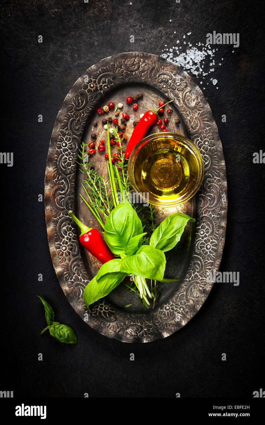 Herbs and Spices on vintage plate Stock Photo