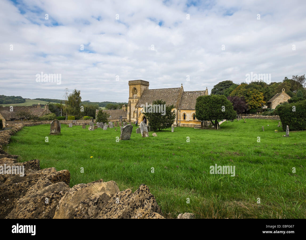 St Barnabas Church and grave yard Snowshill village The Cotswolds Gloucestershire England Stock Photo