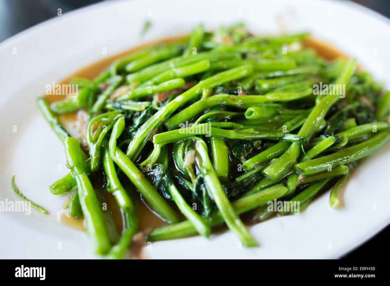Stir Fried Water Spinach Stock Photo