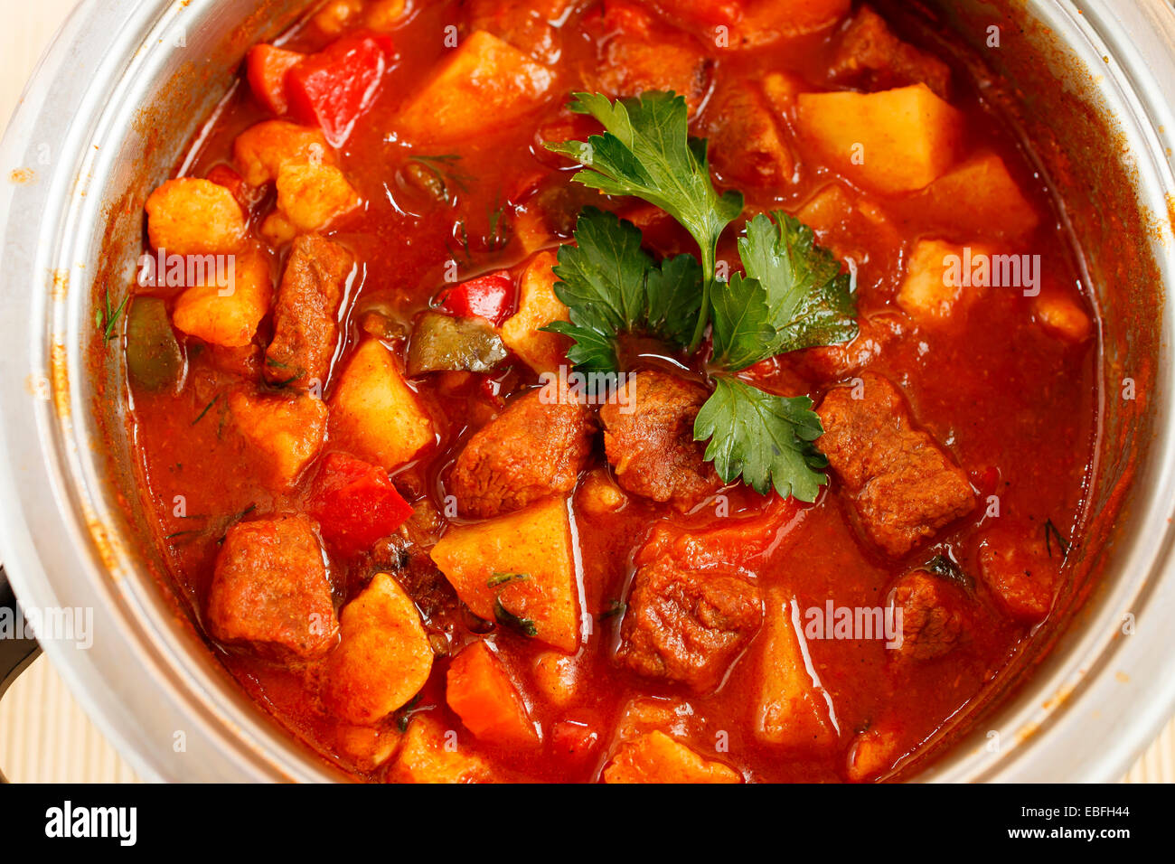 goulash soup in saucepan, tasty and nourishing dinner Stock Photo