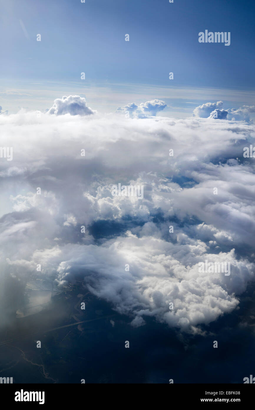 High altitude clouds, cumulus clouds, in color, dramatic photograph. Stock Photo