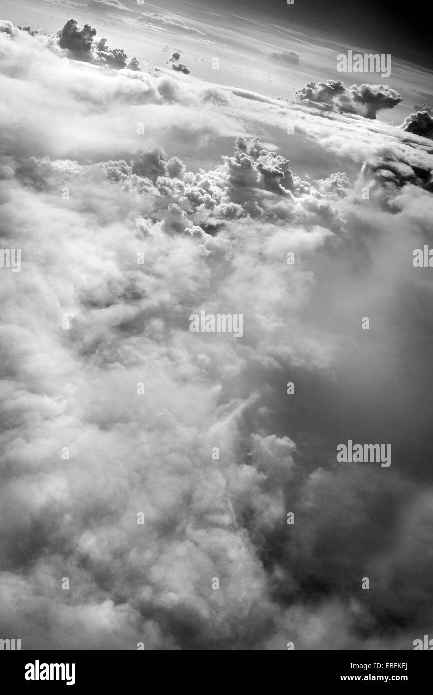 High altitude clouds, cumulus clouds, in black & white, dramatic photograph. Stock Photo