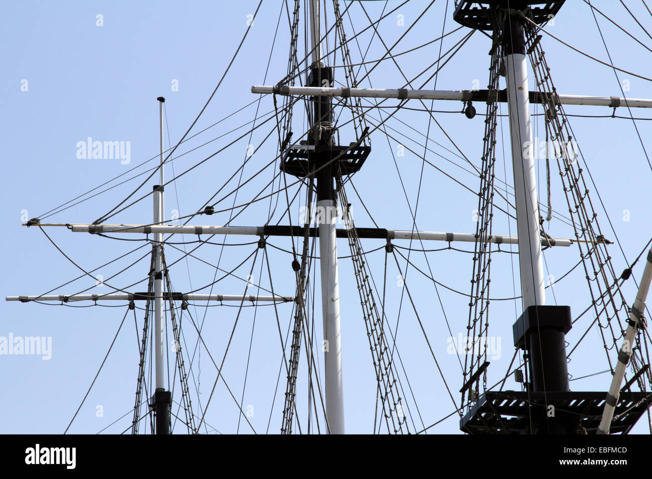 The mast of a sailing ship against a blue sky background Stock Photo ...