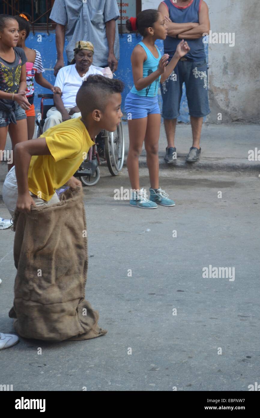 Children participate in a school sports day, on the streets of Centro Habana, Havana, Cuba Stock Photo