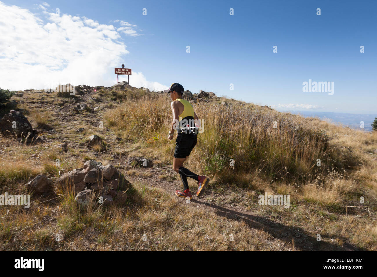 Craig Curley approaching the summit during the Mt Taylor 50k on September 27, 2014 Stock Photo