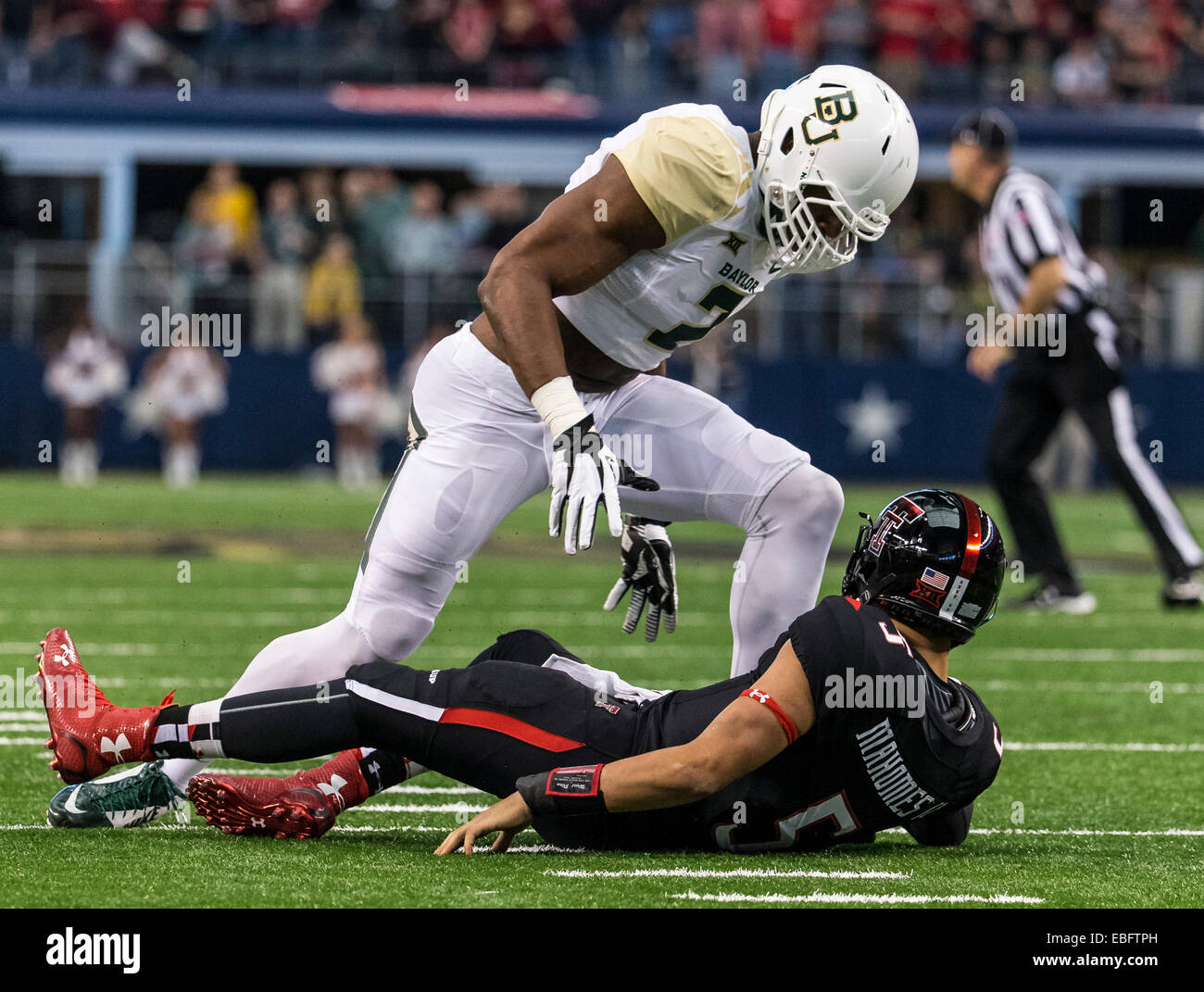 November 29, 2104 Baylor Bears defensive end Shawn Oakman (2) hits