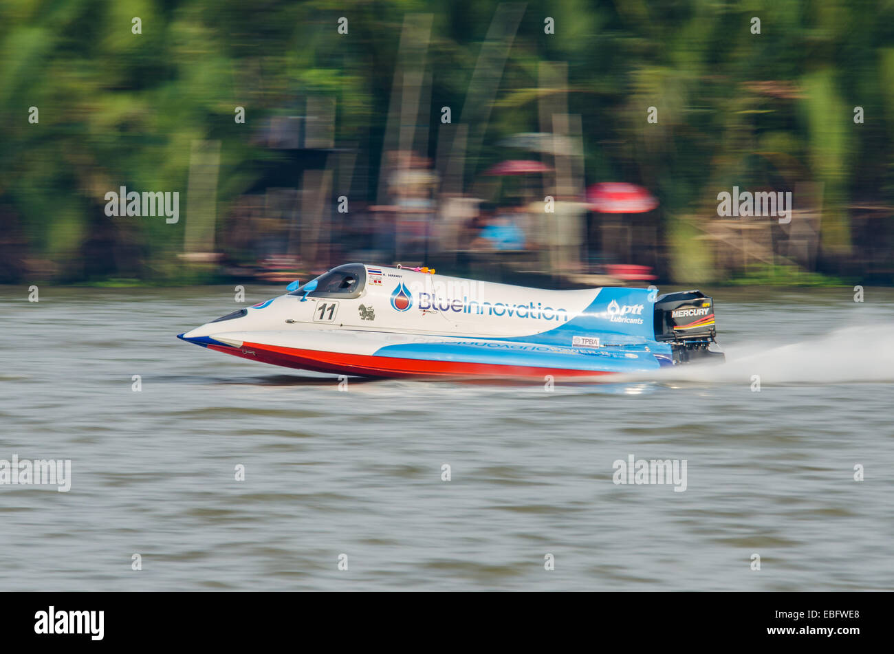 Chachoengsao, Thailand. 30th November, 2014. Sarawut K. with Formula 1 Powerboat No. 11 on display at Singha Thailand Water Sport Festival 2014 on November 30, 2014 in Chachoengsao, Thailand. Credit:  Chatchai Somwat/Alamy Live News Stock Photo