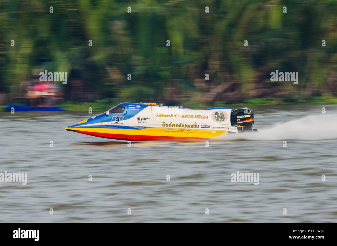 Chachoengsao, Thailand. 30th November, 2014. Taweeporn K. with Formula 1 Powerboat No. 9 on display at Singha Thailand Water Sport Festival 2014 on November 30, 2014 in Chachoengsao, Thailand. Credit:  Chatchai Somwat/Alamy Live News Stock Photo