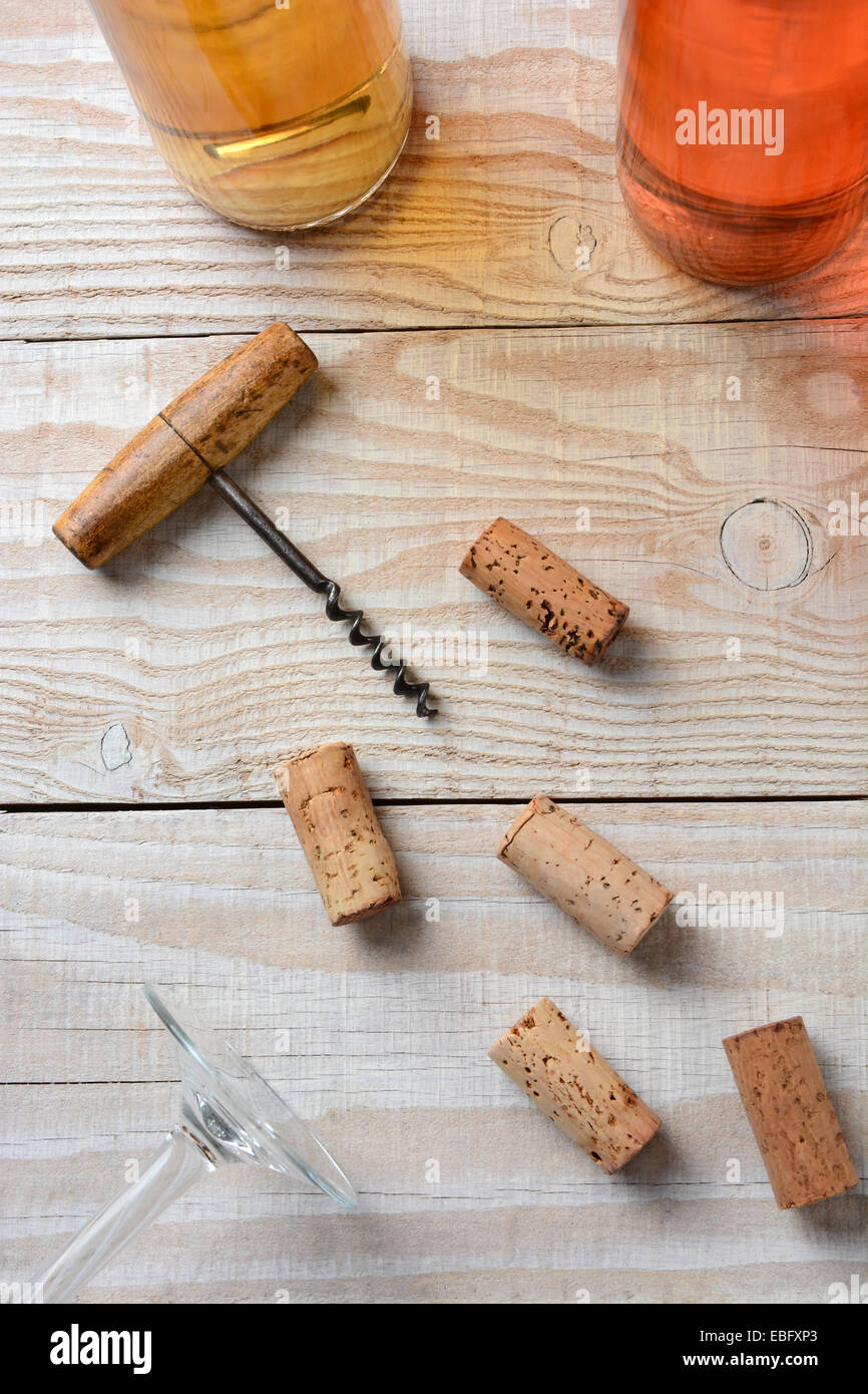 Vertical high angle closeup of an old fashioned corkscrew on a table