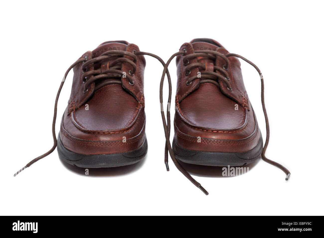 A pair of oxford style shoes with untied laces Stock Photo