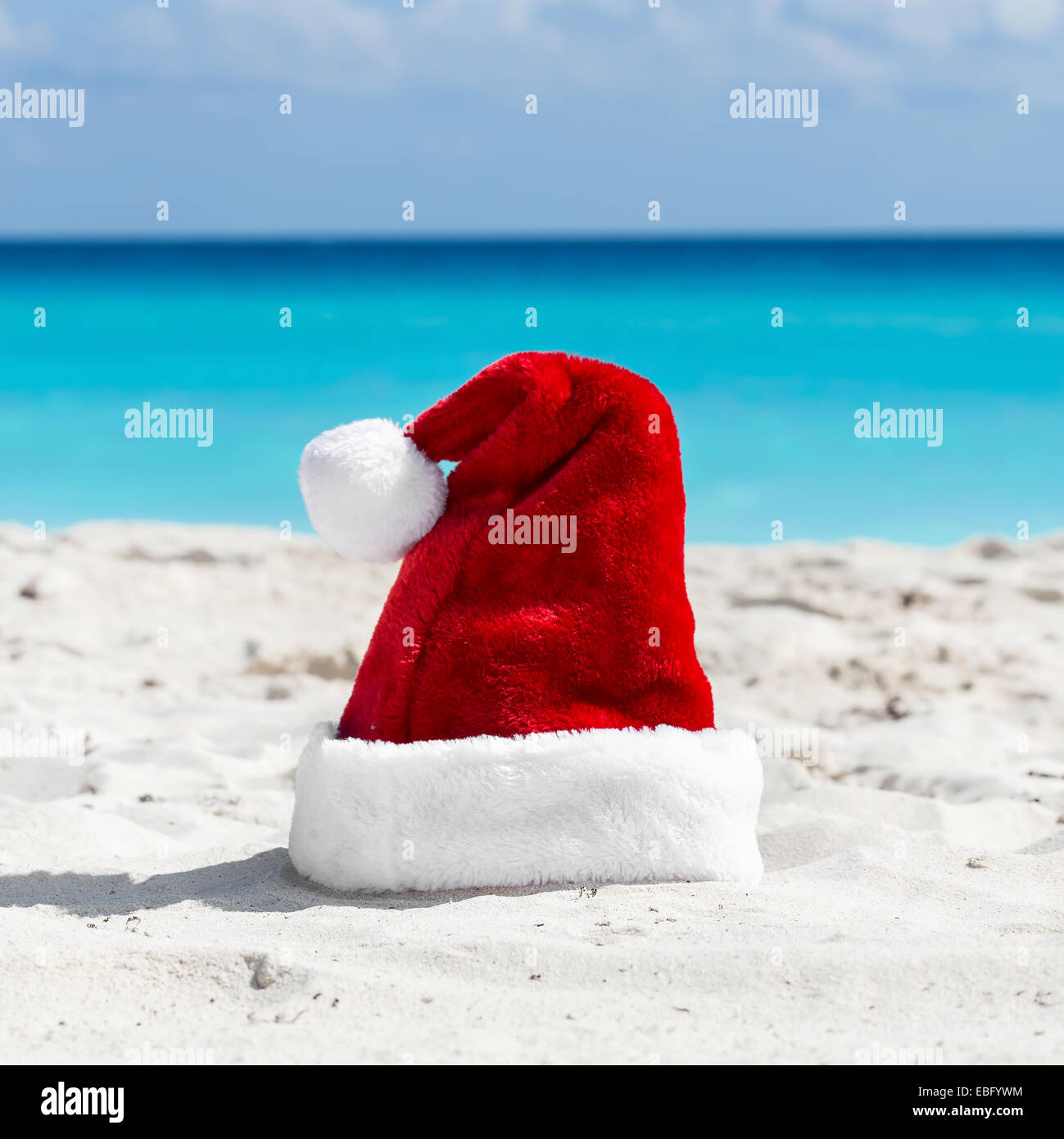 Santa Claus hat at caribbean sandy beach, Cancun. Holiday concept Stock ...