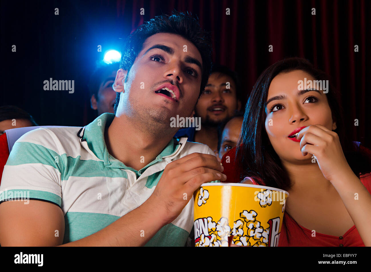 indian couple Cinema Hall enjoy Movie Stock Photo