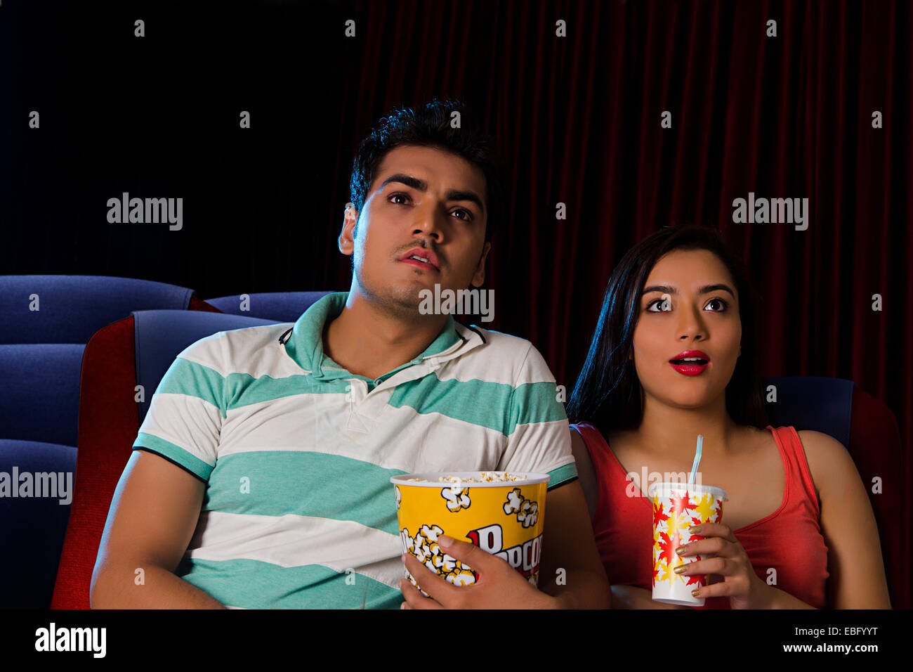indian couple Cinema Hall enjoy Movie Stock Photo