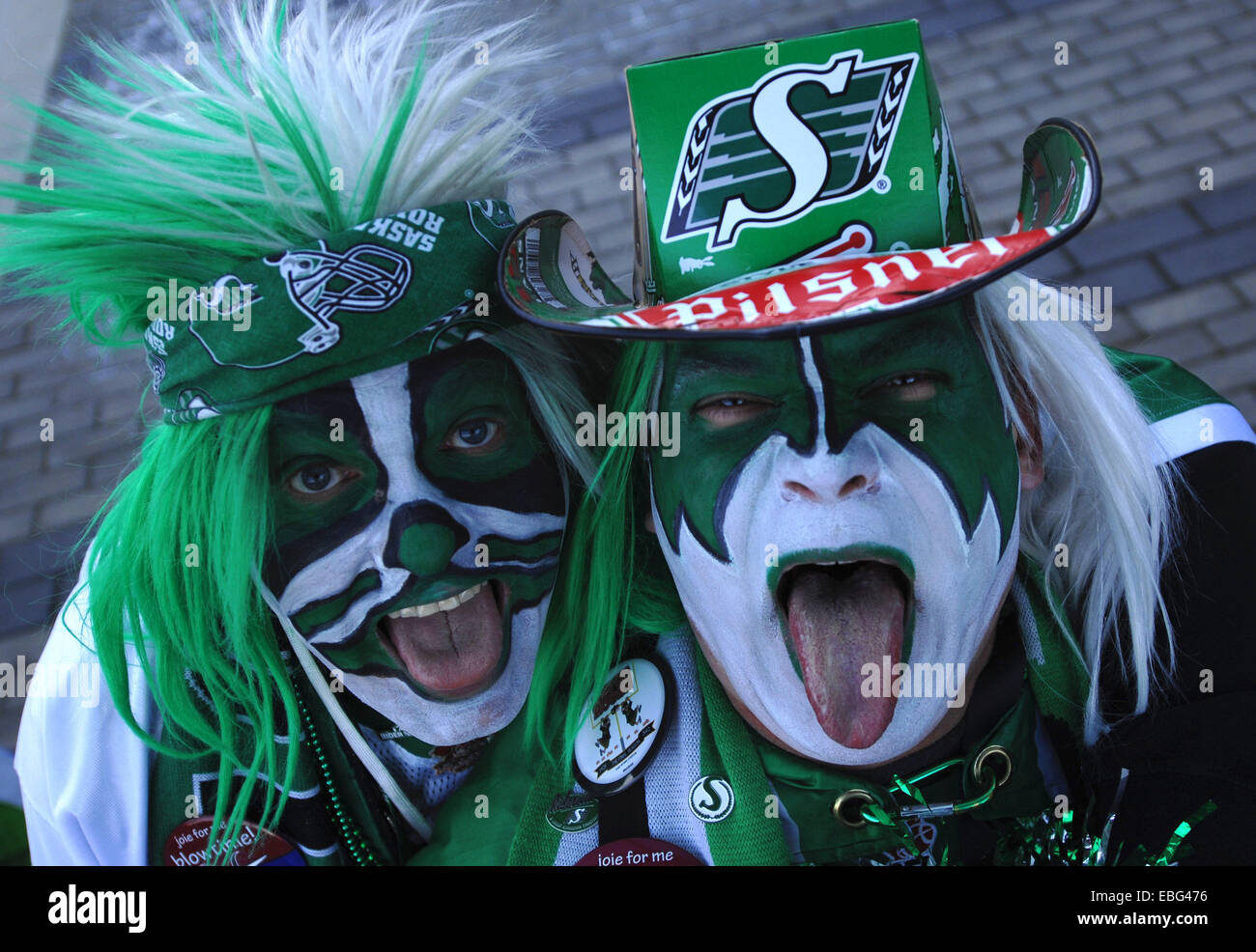 Vancouver, Canada. 30th Nov, 2014. Football fans pose during CFL's 102nd Grey Cup finals in Vancouver, Canada, Nov. 30, 2014. Calgary Stampeders defeated Hamilton Tiger-Cats and captured 102nd Grey Cup. © Sergei Bachlakov/Xinhua/Alamy Live News Stock Photo
