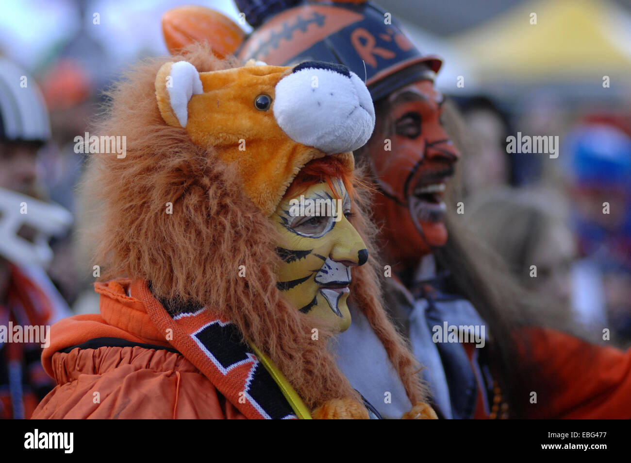 Vancouver, Canada. 30th Nov, 2014. Colorfully dressed football fans pose during CFL's 102nd Grey Cup finals in Vancouver, Canada, Nov. 30, 2014. Calgary Stampeders defeated Hamilton Tiger-Cats and captured 102nd Grey Cup. © Sergei Bachlakov/Xinhua/Alamy Live News Stock Photo