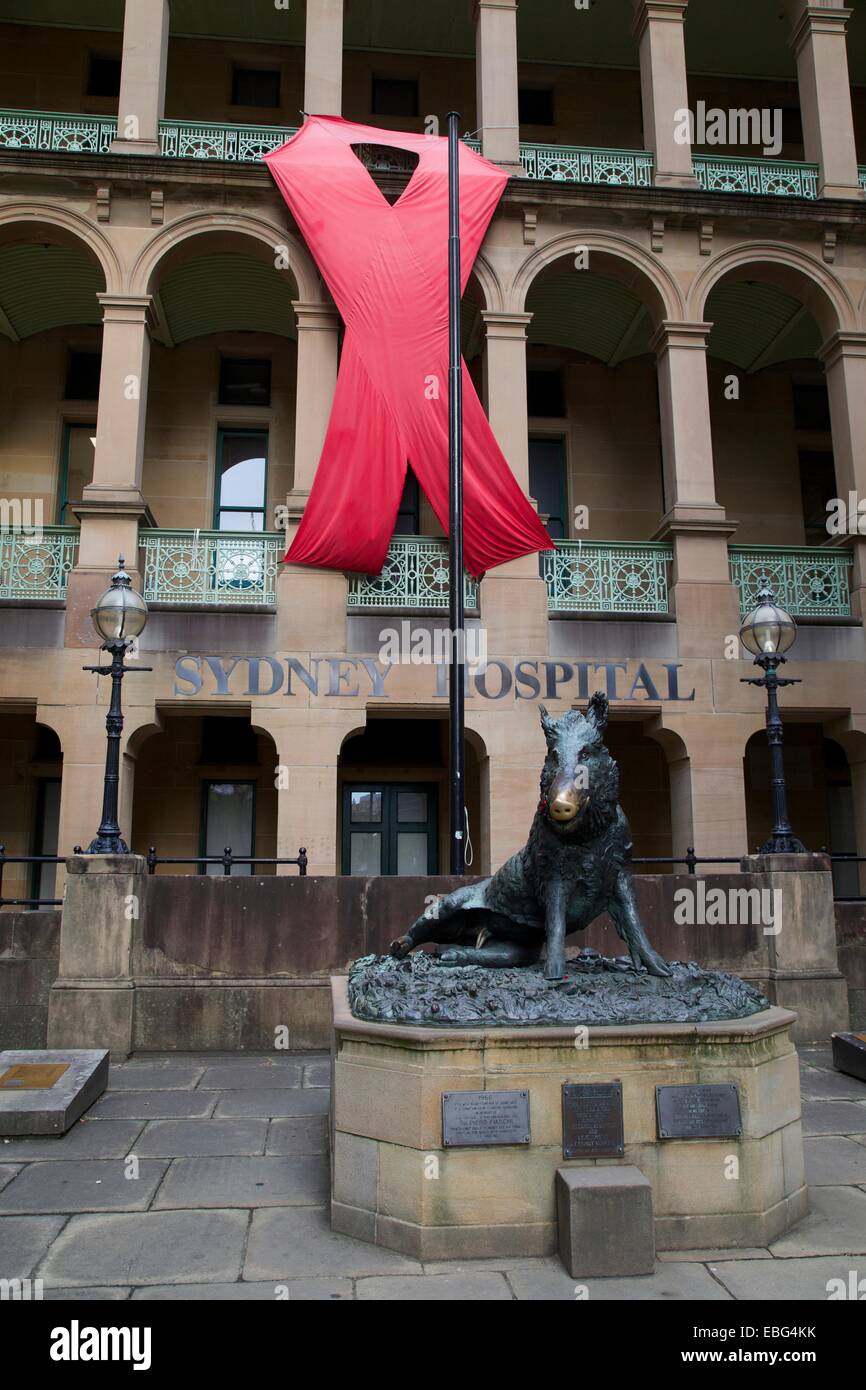 Sydney, Australia. 1 December 2014. The Sydney Hospital on Macquarie Street has a giant red ribbon for World AIDS Day. Copyright Credit:  2014 Richard Milnes/Alamy Live News. Stock Photo