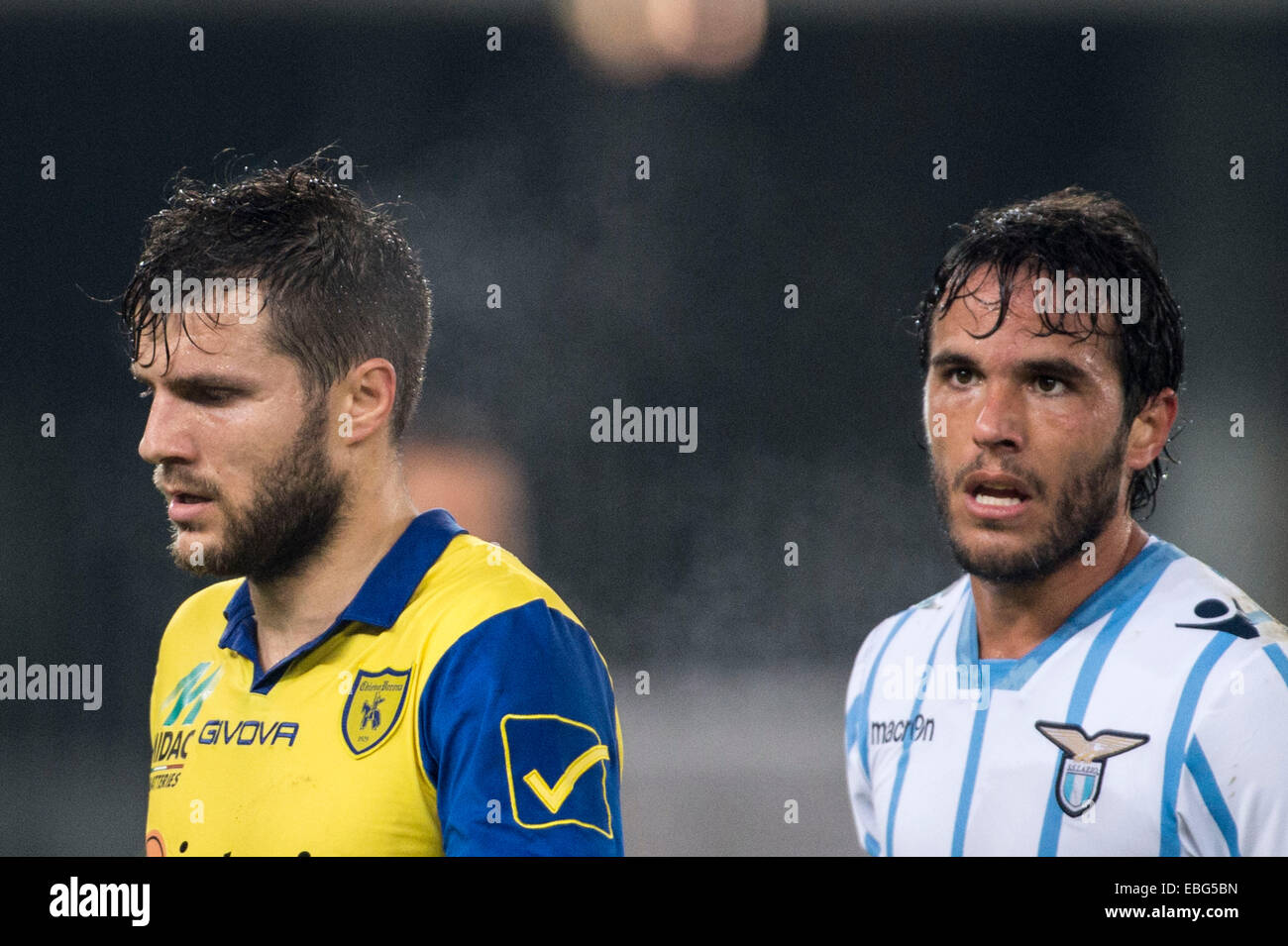 Verona, Italy. 29th Nov, 2014. Perparim Hetemaj (Chievo), Alvaro Gonzalez (Lazio) Football/Soccer : Italian 'Serie A' match between Chievo Verona 0-1 SS Lazio at Stadio Marc'Antonio Bentegodi in Verona, Italy . © Maurizio Borsari/AFLO/Alamy Live News Stock Photo