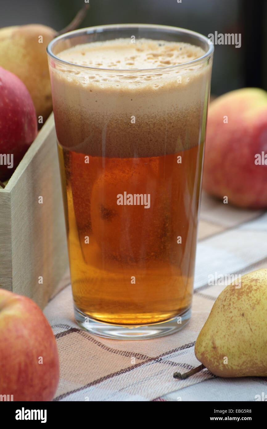 Glass of freshly squeezed apple and pear juice Stock Photo - Alamy