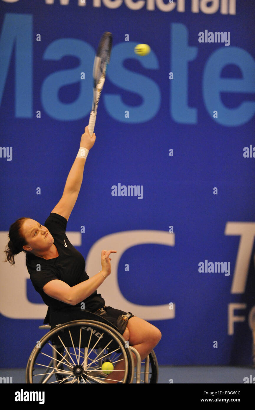 Birmingham, UK. 30th November, 2014. Aniek van Koot (NED) serving during her finals match with Jiske Griffioen (NED) at the NEC Wheelchair Tennis Masters competition. After losing the first set, van Koot won the match scoring 3-6, 6-4, 6-1. Credit:  Michael Preston/Alamy Live News Stock Photo